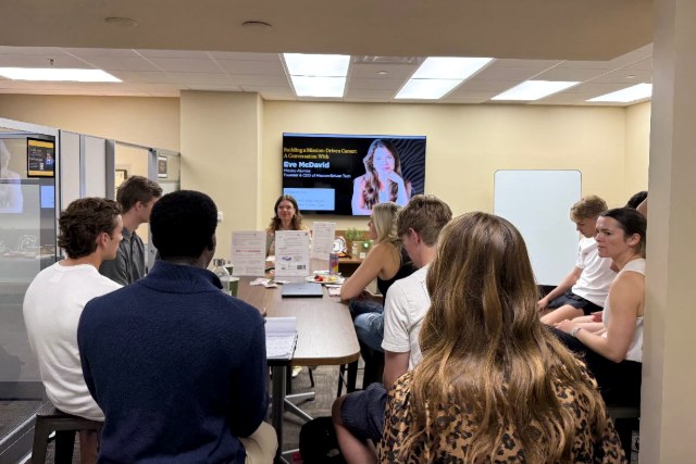 Eve McDavid speaking with Mizzou CEO members